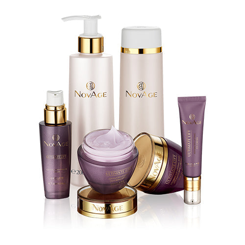 A collection of skincare products arranged neatly against a light peach background. Includes bottles, jars, and tubes evoking a natural, serene vibe.