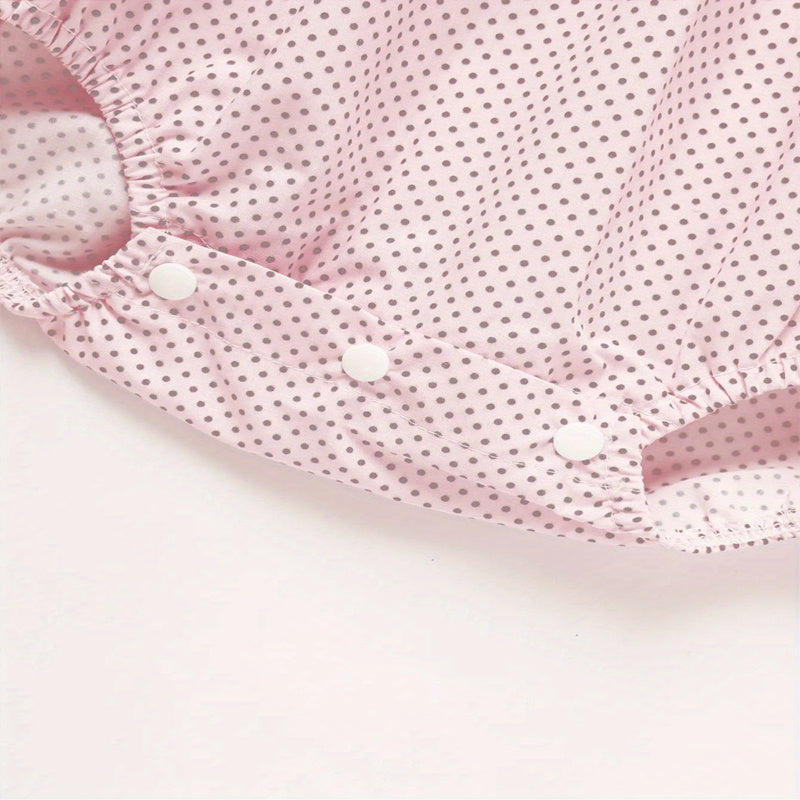 Baby girl romper by Nova Mart with pink polka dot pattern, heart embroidery, ruffle details, short sleeves, perfect for little girls.