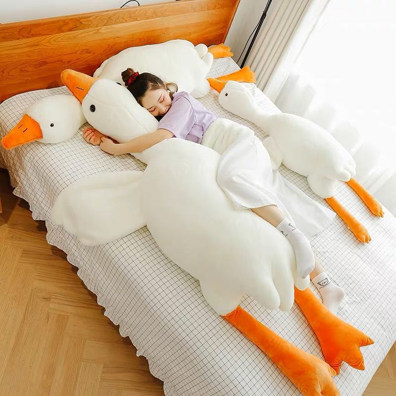 White goose plush pillow toy from Nova Mart featuring a soft, cuddly design perfect for comfortable decor or play.
