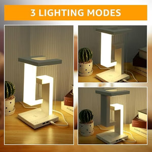 Table lamp with 3 lighting modes on a wooden surface with plants.