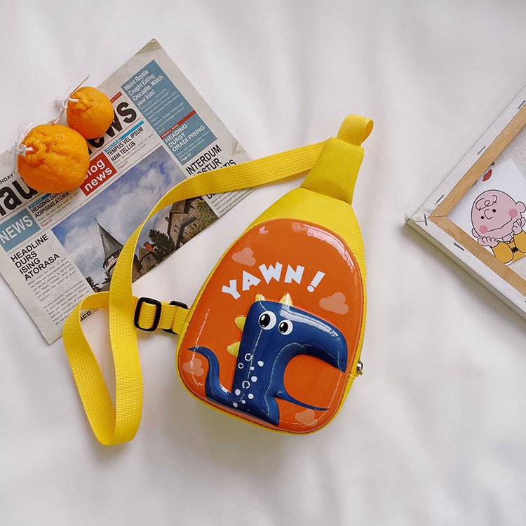 Yellow and orange cartoon 3D hard shell chest bag for kids, featuring playful design on a white surface.