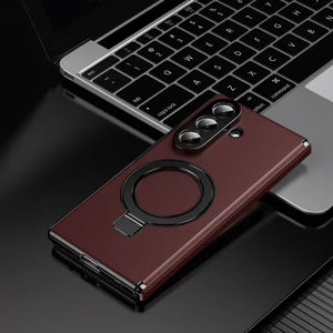 Phone case with ring holder on a laptop keyboard