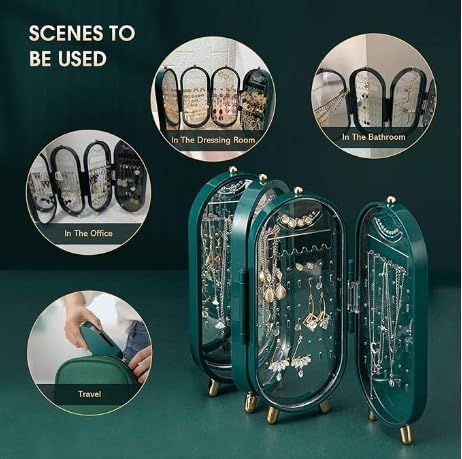 Green jewelry organizer with various compartments on a dark green background