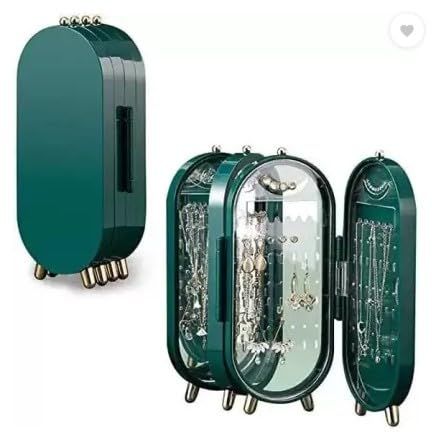 Green jewelry organizer with mirror on a white background