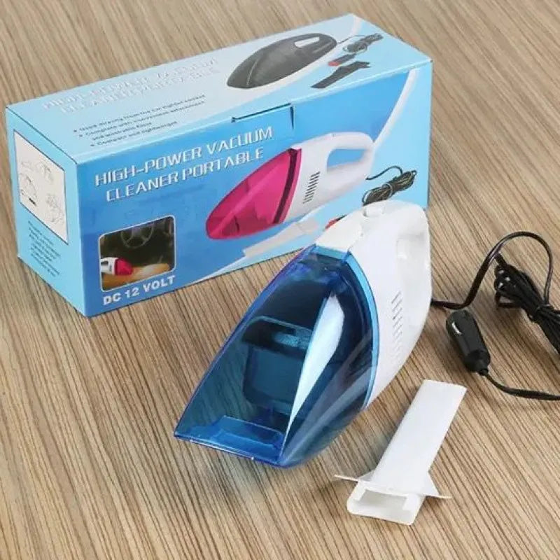 Portable vacuum cleaner with blue and white design on a wooden surface, next to its packaging.