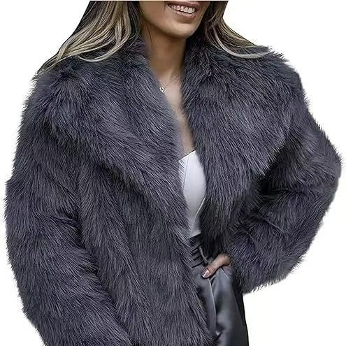 Person wearing a fluffy gray coat on a white background