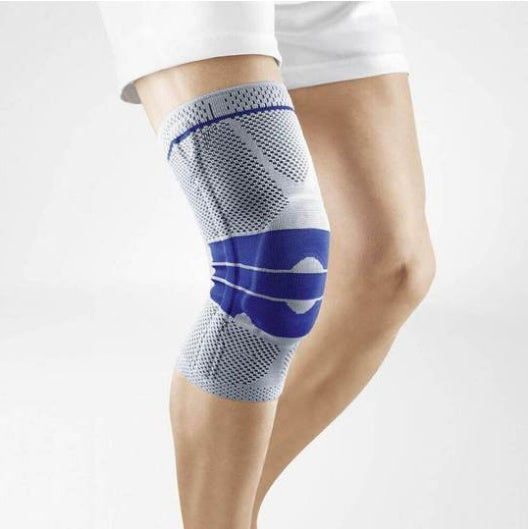 Nova Mart compression knee sleeve with strap, designed for sports support and recovery, shown on a person's knee.