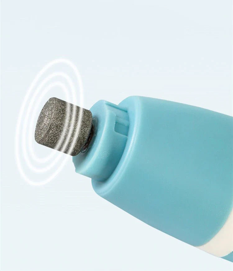 Close-up of a blue nail drill bit on a light gray background
