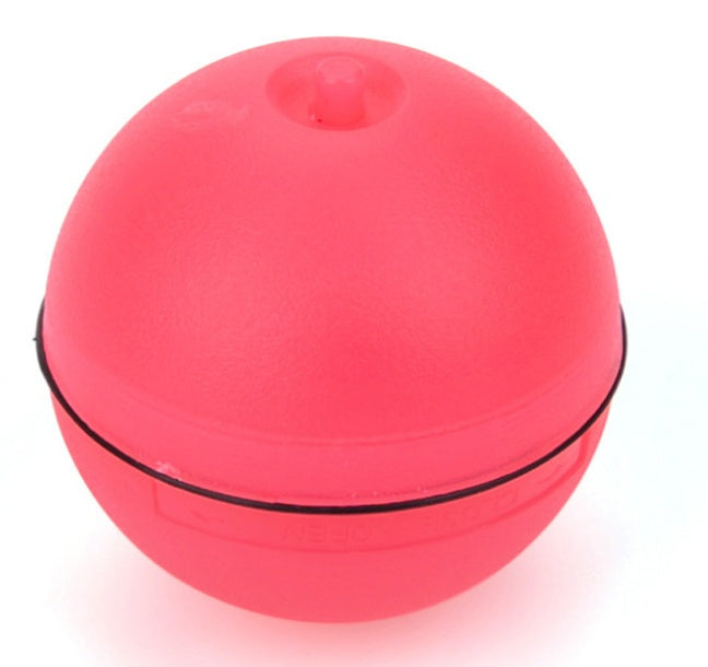 Pink ball with a black rim on a white background