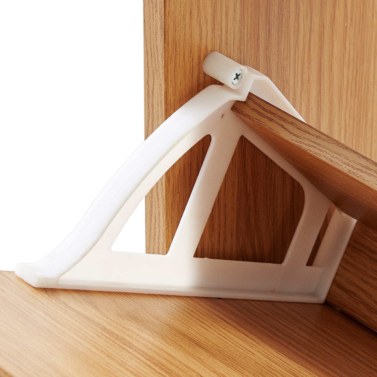 White corner protector on a wooden surface