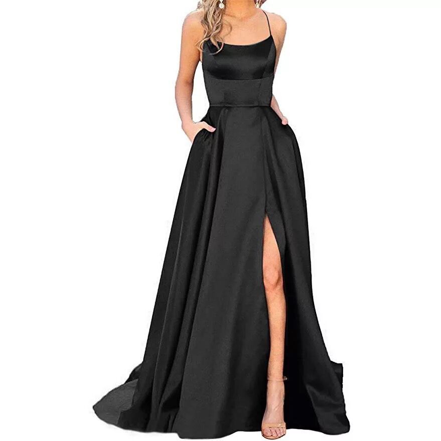 Navy blue evening gown with a high slit on a white background