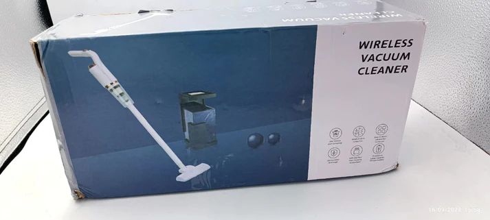 Box of a wireless vacuum cleaner on a white surface