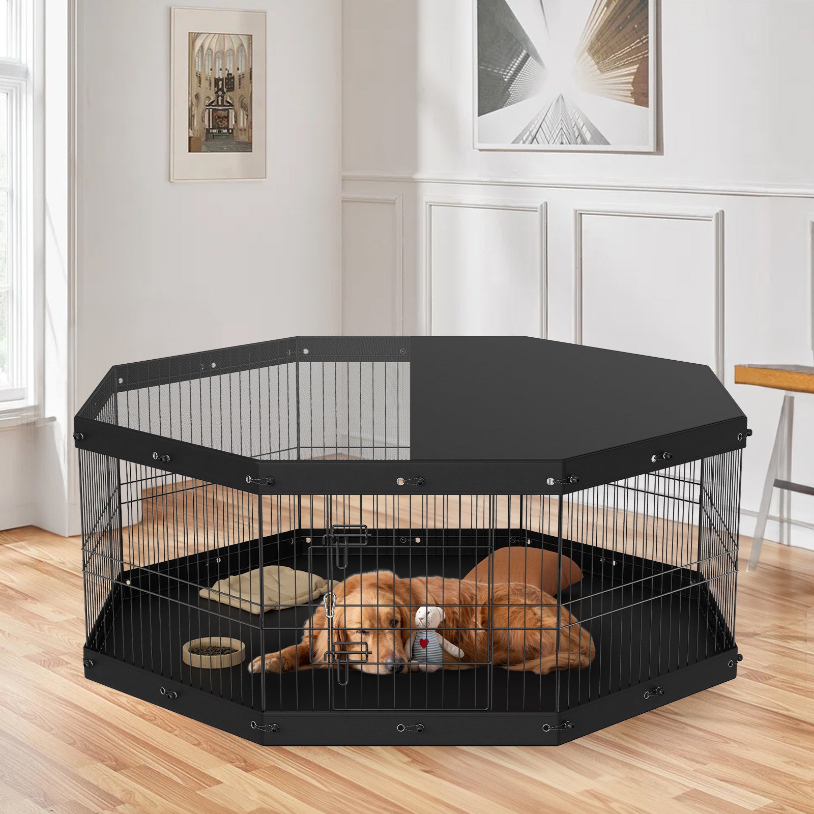 Black hexagonal pet playpen with a dog inside in a room with light-colored walls and wooden flooring.
