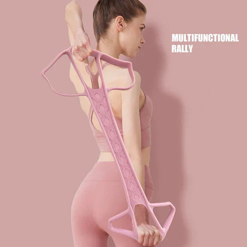 Woman holding a pink multifunctional rally tool against a pink background