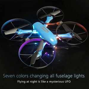 Drone with changing fuselage lights on a dark background